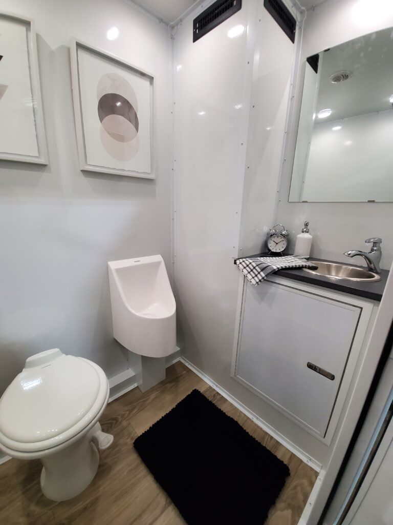 ADA 2-Stall Luxury Restroom Trailer Urinal View | The Lavatory Utah